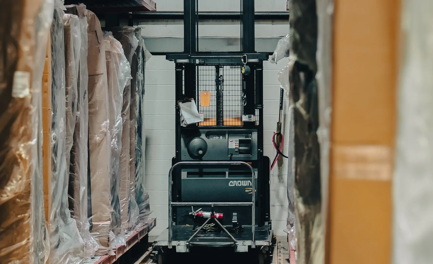 A warehouse with boxes and pallets ready to move