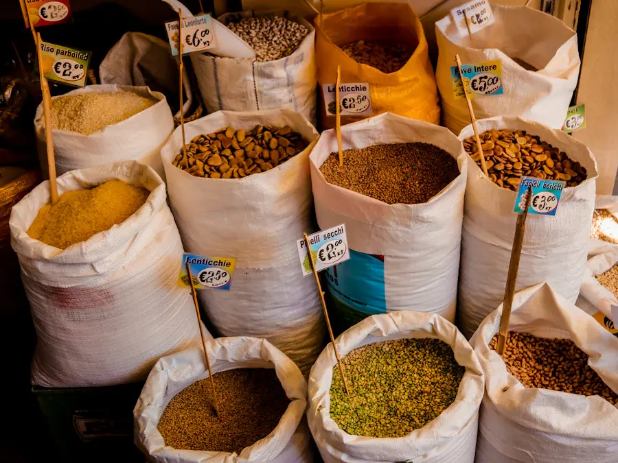 Open sacks of grains and nuts at a market